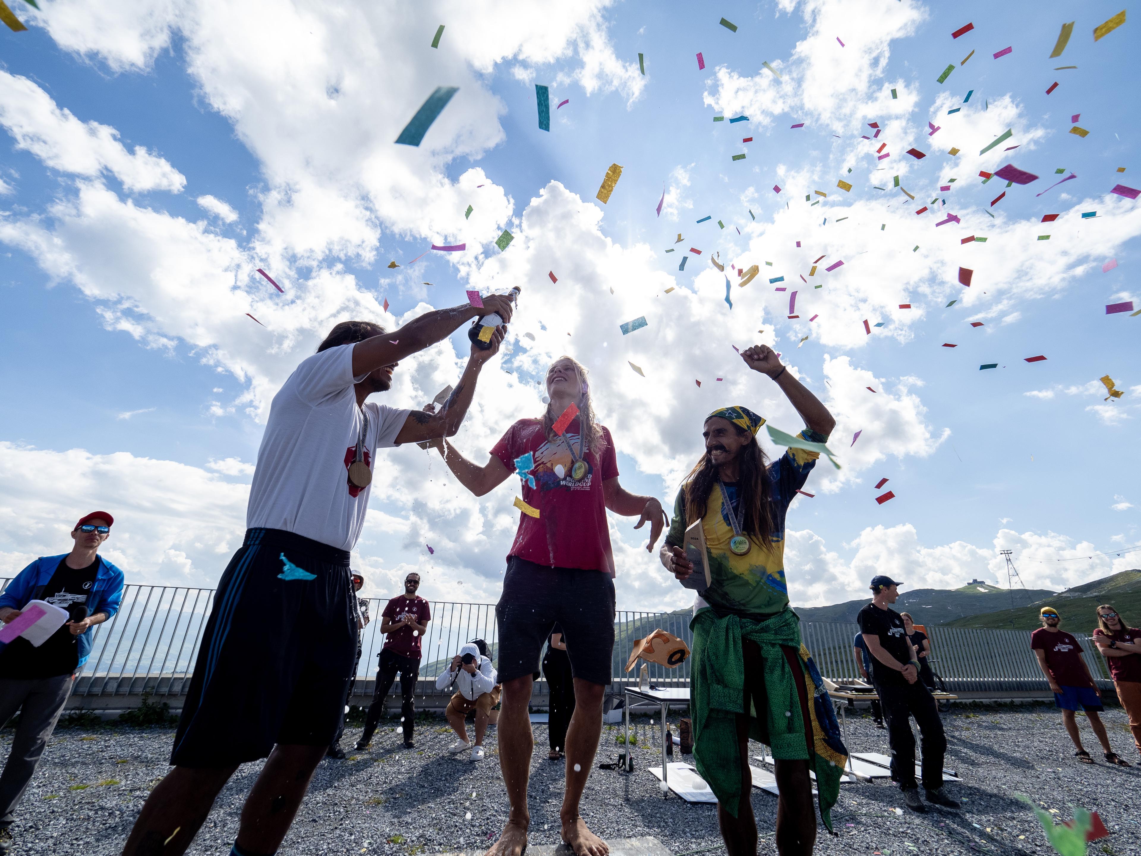 Athletes celebrating on the podium
