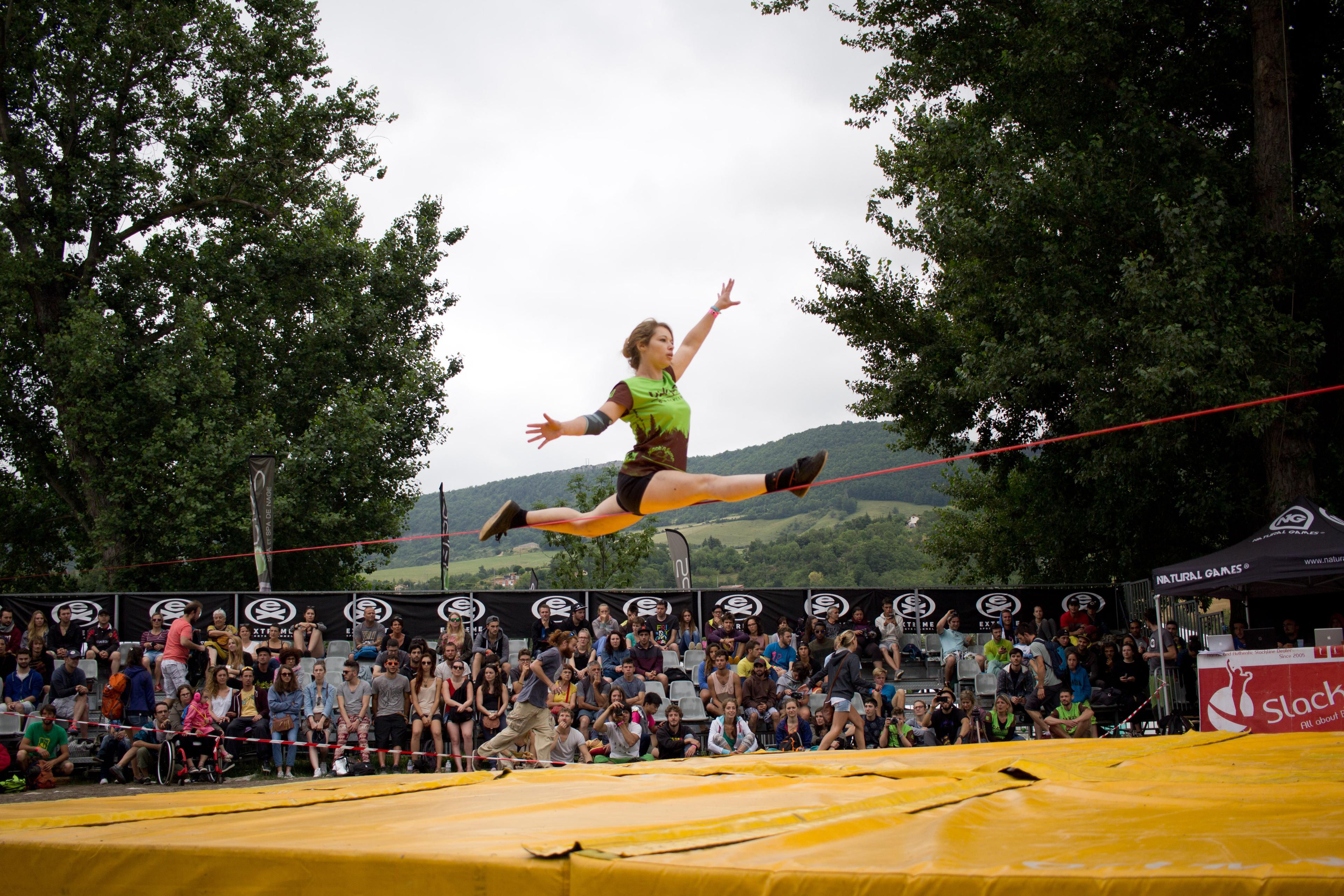 Trickline athlete mid-combo